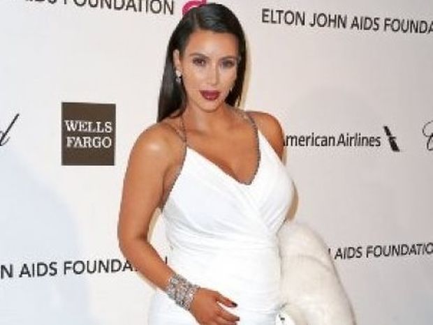 Δείτε την Kim Kardashian... έφηβη, με κοιλιακούς-φέτες και πλούσιο στήθος!